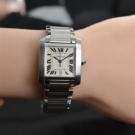 cartier stainless steel tank watch.